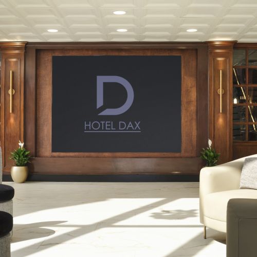 A chalkboard with a letter &ldquo;D&rdquo; drawn, outdoor seating, and a chalkboard sign in a sunny cafe setting.