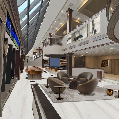 Luxurious hotel lobby with marble floors, modern seating, a mezzanine balcony, and a sleek, open-concept lounge area.